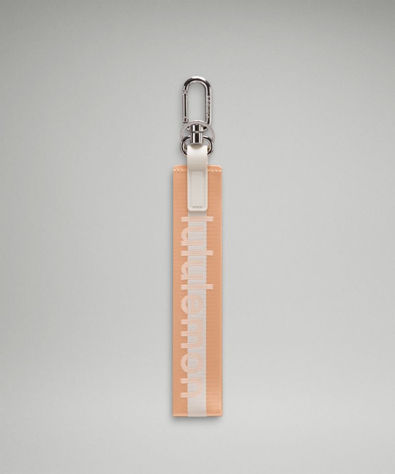 Lululemon | Men's Never Lost Keychain Wordmark Peach Bellini / White Opal / White