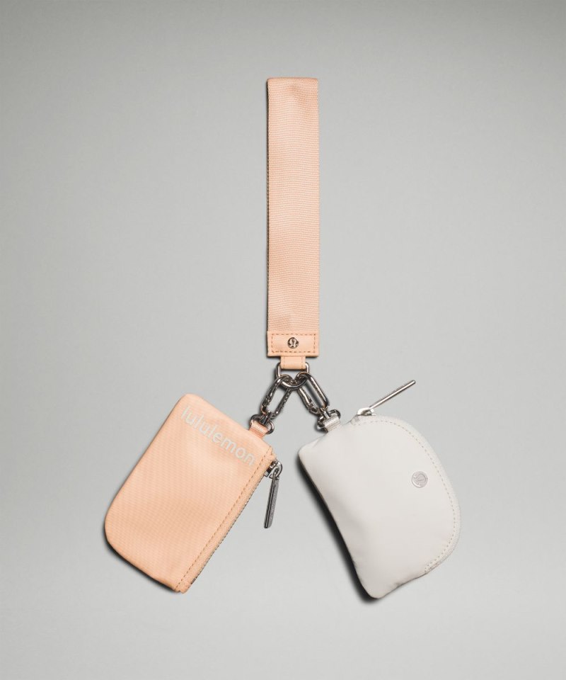 Lululemon | Women's Dual Pouch Wristlet Peach Bellini / White Opal