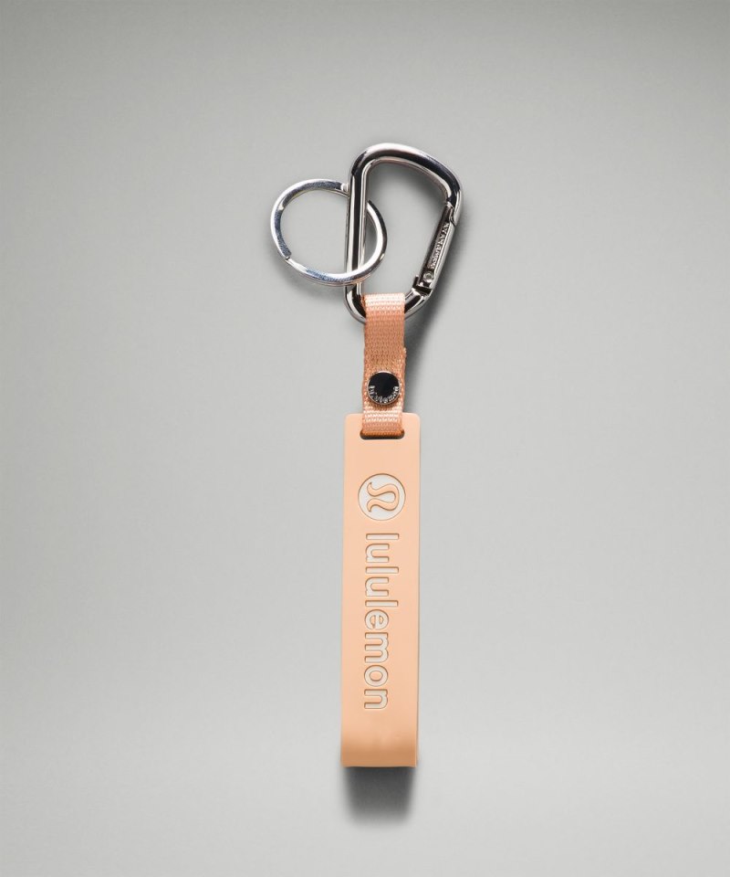 Lululemon | Men's Silicone Keychain Peach Bellini / White Opal